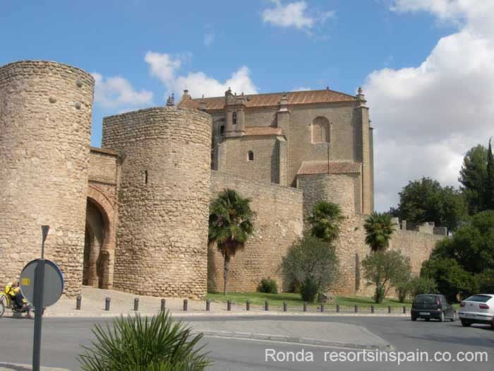 The Almocabar Gate and City Walls in front of The Church of the Holy Spirit