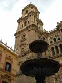 Malaga Cathedral with fountain in forground
