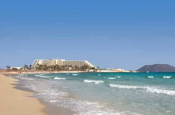 Corralejo's Playa Grande Beach Riu Palace Tres Islas beach hotel in the background