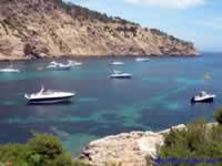 Cala Llonga bay is a popular anchorage for boats